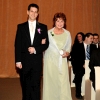 Mom walking Eric down the Aisle